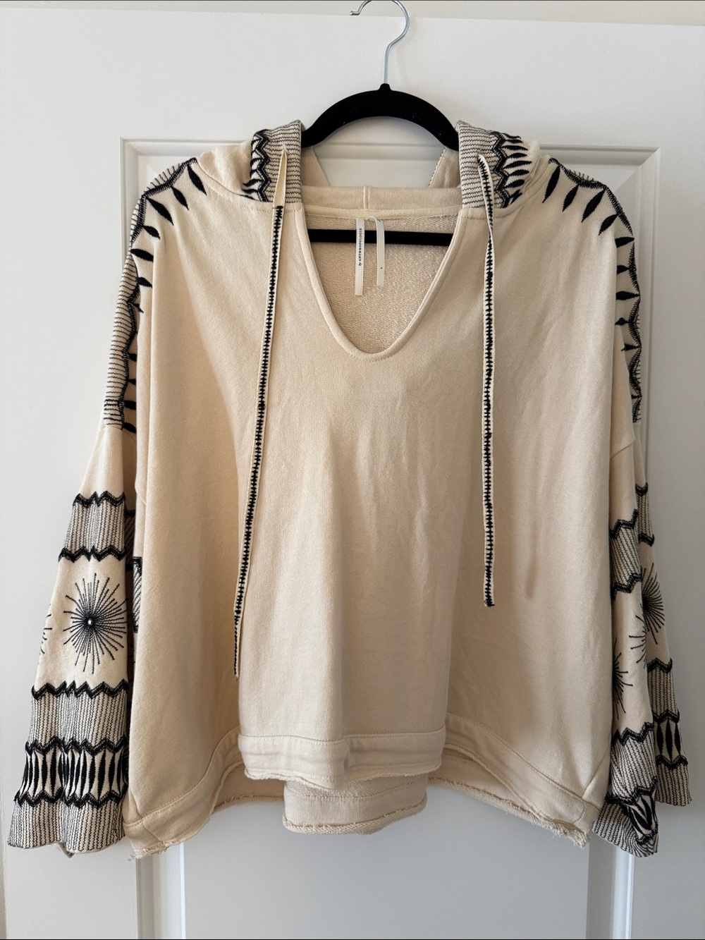 Anthropologie Cream Hooded Pullover with Black Embroidered Sleeve Detail